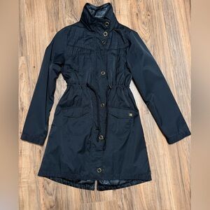 DC Woman’s LG Trench Coat with hideaway hood.